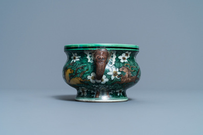 A Chinese verte biscuit 'flaming horses' censer, Jiajing mark, 18/19th C.