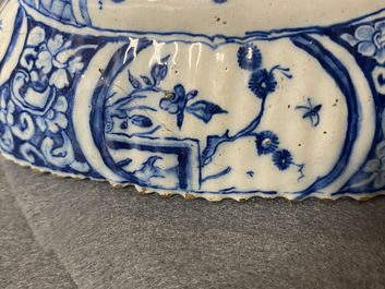 A ribbed Dutch Delft blue and white chinoiserie brush back, 18th C.