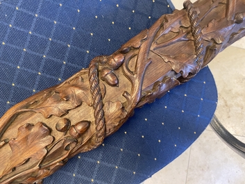 A mahogany boat mast with oak scrolls, France or Italy, 18th C.