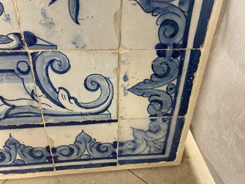 A blue and white Portuguese tile mural depicting an urn filled with flowers and fruits, 18th C.