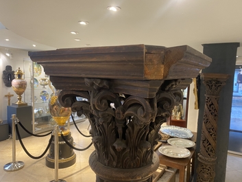 A pair of reticulated carved oak Corinthian columns with cherub heads and vines, 17th C.