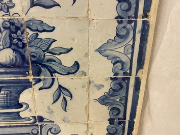 A blue and white Portuguese tile mural depicting an urn filled with flowers and fruits, 18th C.