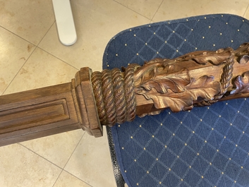 A mahogany boat mast with oak scrolls, France or Italy, 18th C.