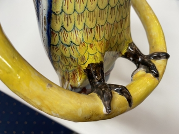 A polychrome Dutch Delft model of a parrot on a ring, 18th C.