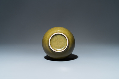 A Chinese monochrome teadust-glazed bottle vase, 19th C.