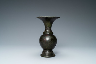 A Chinese bronze vase with incised taotie masks, Song/Yuan