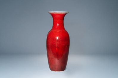 A Chinese monochrome sang de boeuf bottle vase, 19/20th C.