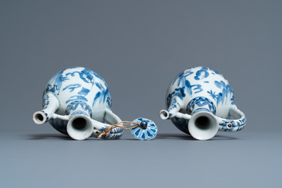 A pair of Japanese blue and white Arita jugs, Edo, 17th C.