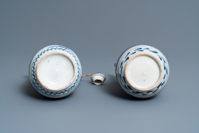 A pair of Japanese blue and white Arita jugs, Edo, 17th C.