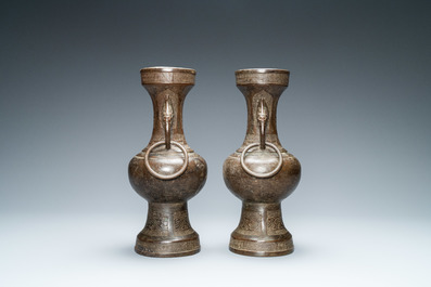 A pair of Chinese bronze vases, Yuan