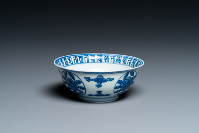 A Chinese blue and white 'dragon' bowl with lanca-characters, Wanli mark and of the period