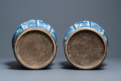 A pair of large Chinese blue and white covered vases, 19th C.