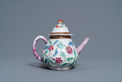 A Chinese famille rose relief-decorated teapot on stand, Yongzheng