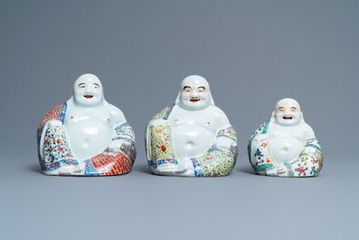 Five Chinese famille rose and white figures of Buddha, seal marks, 19/20th C.