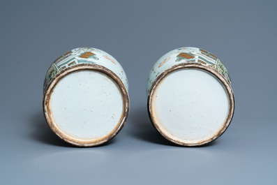 A pair of Chinese qianjiang cai vases and covers with antiquities, 19/20th C.