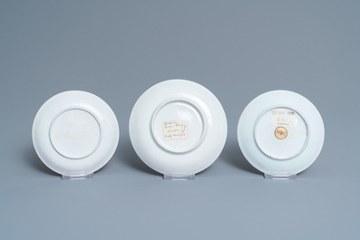 Three Chinese famille rose ruby-ground cups and saucers, Yongzheng