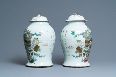 A pair of Chinese qianjiang cai vases and covers with antiquities, 19/20th C.