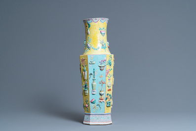 A Chinese famille rose vase with applied 'antiquities' design, 19th C.