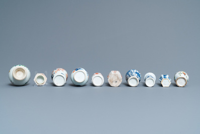 Ten mostly Chinese blue and white, famille rose and Imari-style vases, Kangxi and later