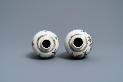 A pair of Chinese famille verte jars with birds among blossoming branches, Kangxi