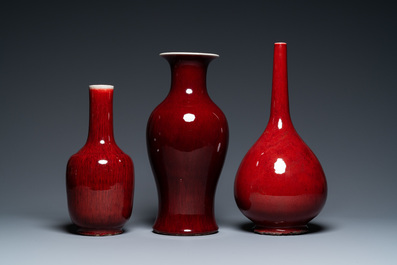 Three Chinese monochrome sang de boeuf vases, 19/20th C.