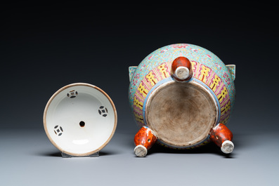 A Chinese famille rose tripod censer and cover, 19th C.