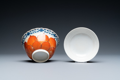 A Chinese iron-red, gilt and blue and white covered bowl on stand, 19th C.