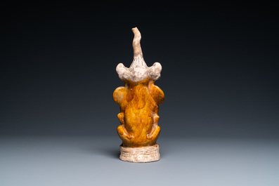 A Chinese sancai-glazed pottery 'earth spirit' figure, Tang - Rob