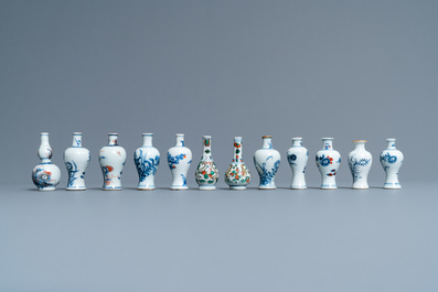 Thirty-eight Chinese blue and white, famille rose and monochrome miniature vases, Kangxi/Qianlong