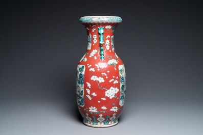 A Chinese famille rose ruby-ground vase, 19th C.