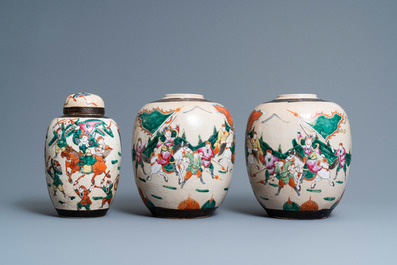 A pair of Chinese famille rose Nanking crackle-glazed jars and a jar with cover, 19th C.