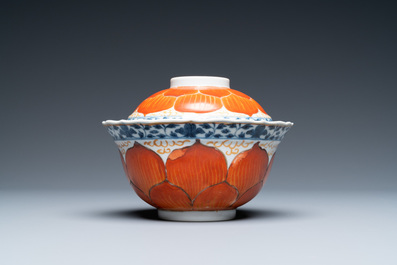 A Chinese iron-red, gilt and blue and white covered bowl on stand, 19th C.