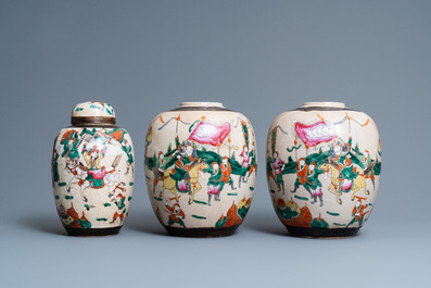 A pair of Chinese famille rose Nanking crackle-glazed jars and a jar with cover, 19th C.