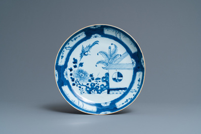 Fifteen Chinese blue and white plates and three dishes with 'cuckoo in the house' design, Qianlong