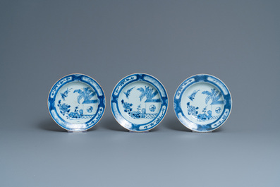 Fifteen Chinese blue and white plates and three dishes with 'cuckoo in the house' design, Qianlong