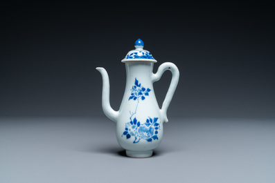 A Chinese blue and white ewer with floral design, Transitional period