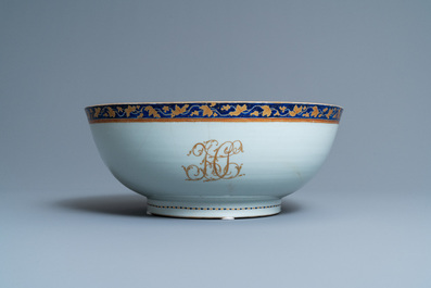 A large Chinese monogrammed export porcelain punchbowl and dish, Qianlong