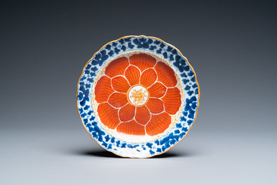 A Chinese iron-red, gilt and blue and white covered bowl on stand, 19th C.