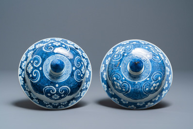 A pair of large Chinese blue and white covered vases, 19th C.