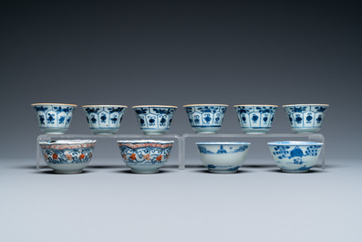 Twenty-two Chinese blue and white and famille rose cups and nineteen saucers, Kangxi and later