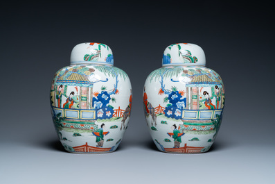 A pair of Chinese wucai jars and covers, Wanli mark, 19th C.