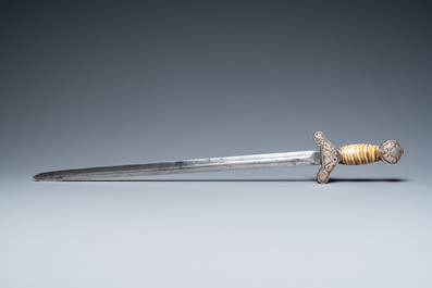 A Tibetan steel sword with silvered copper and mammoth tooth hilt, 19th C.