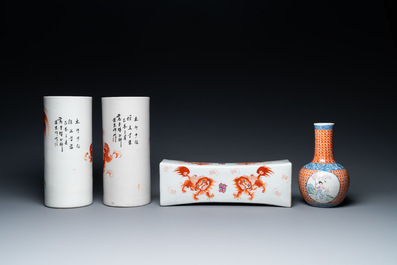 A Chinese famille rose 'playing boys' vase, a pair of hat stands and a head rest with Buddhist lions, 19/20th C.