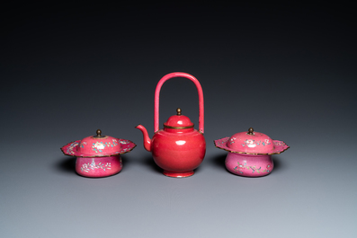 A Chinese ruby-ground Canton enamel teapot and a pair of covered bowls, Qianlong/Jiaqing