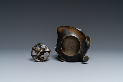 A Chinese peach-shaped bronze censer and cover, Qing