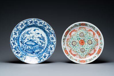 Three Chinese blue and white dishes and one famille verte dish, Ming, Kangxi and Qianlong