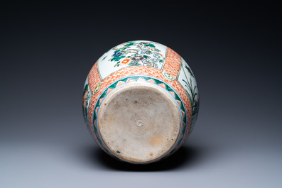 A pair of Chinese blue and white bowls and a famille verte vase, 19th C.