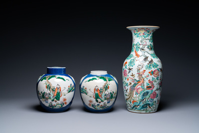 A Chinese famille rose vase and a pair of famille verte powder blue-ground jars, 19th C.