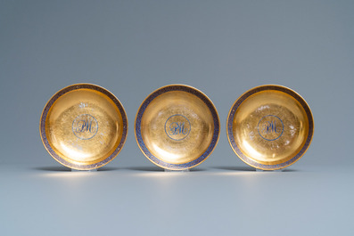 Six rare Chinese monogrammed gilt-ground cups and saucers, Yongzheng/Qianlong