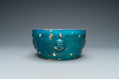 A Chinese monochrome turquoise-glazed bowl with reticulated wooden cover, Ming